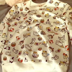 Very cute neko atsume sweater.